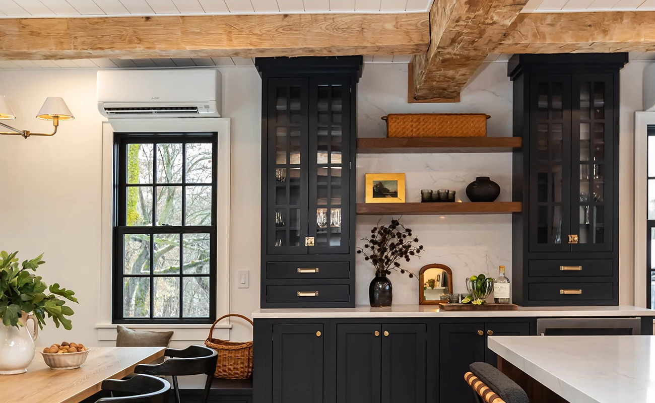 Bertch Quincy indigo wet bar built-in with walnut accents and inset doors