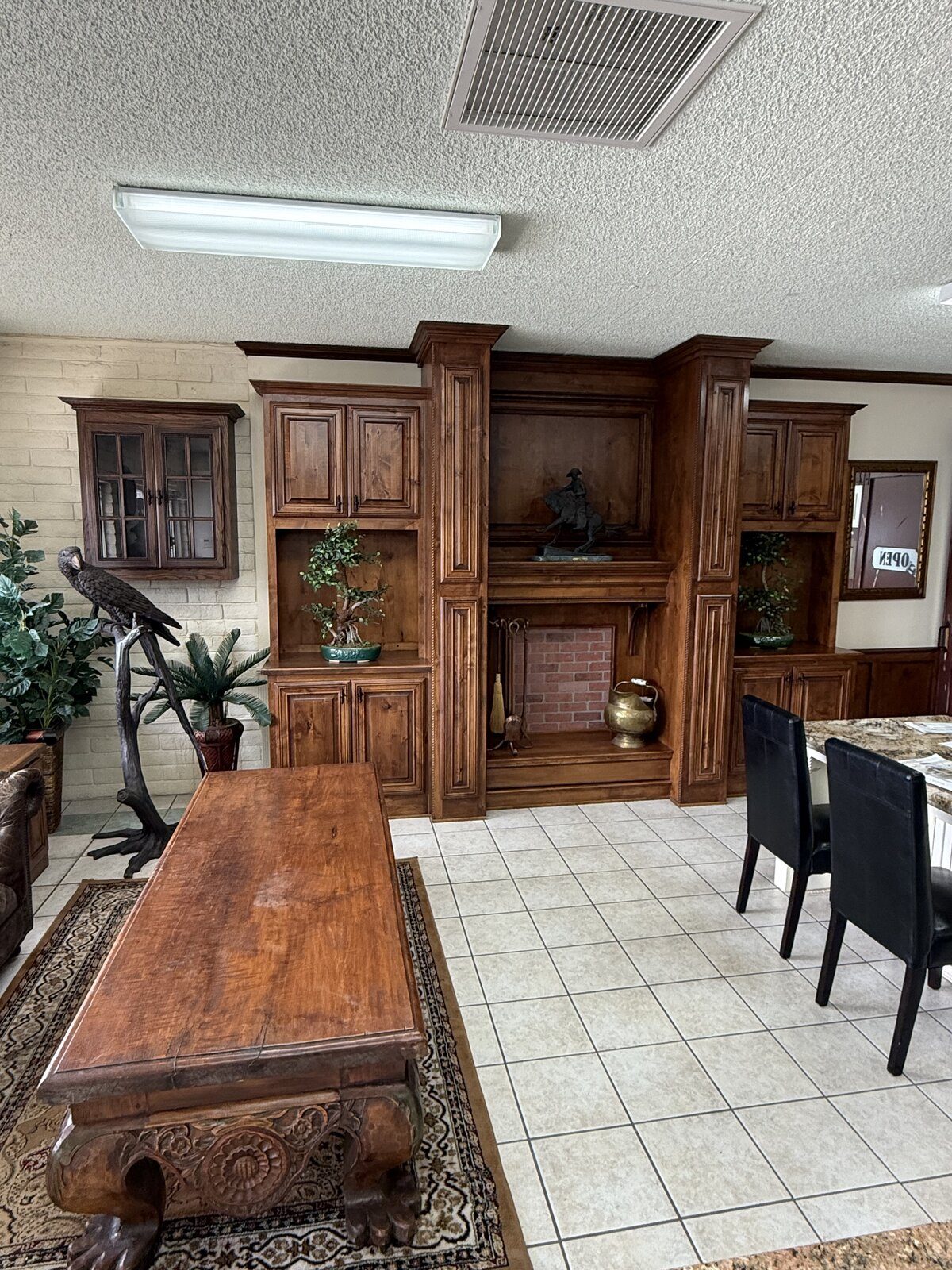 Custom commercial casework and reception desk built by Add-More-Cabinets